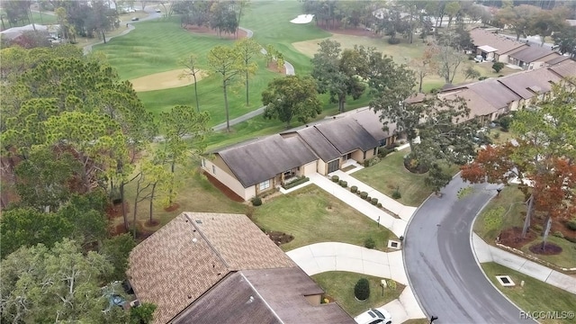 birds eye view of property with golf course view