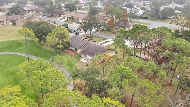 bird's eye view featuring view of golf course and a residential view