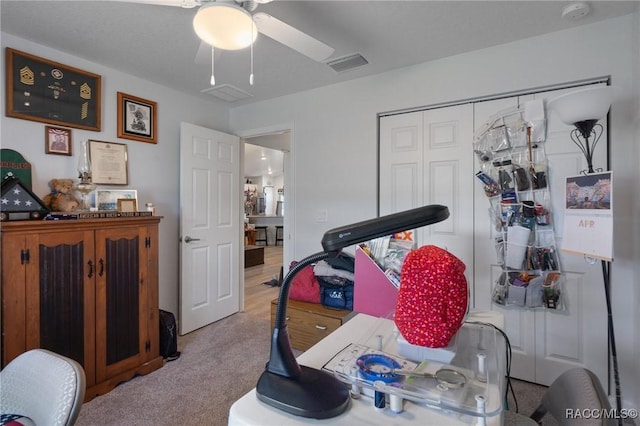 10541 S Drew Bryant Cir, Floral City, FL 34436 - workout area with visible vents, carpet floors, and ceiling fan