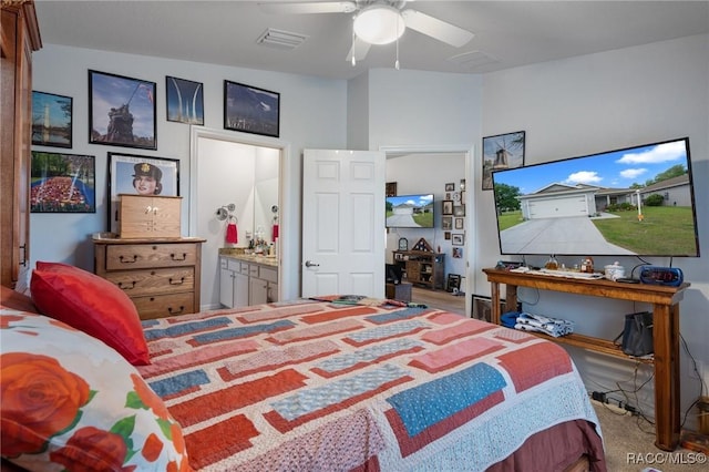 10541 S Drew Bryant Cir, Floral City, FL 34436 - carpeted bedroom with ceiling fan, visible vents, and ensuite bathroom