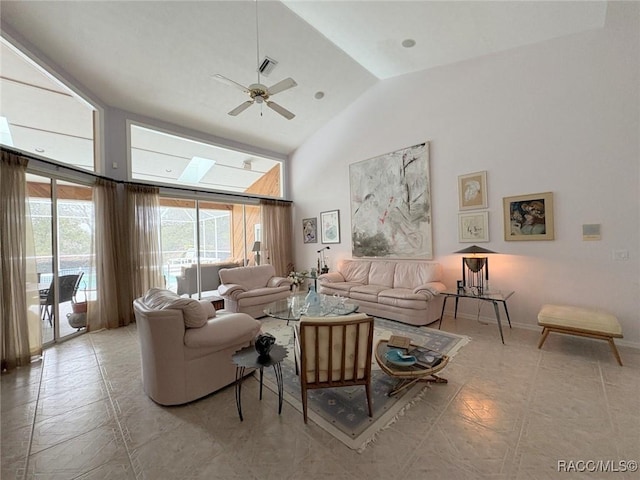 living room with high vaulted ceiling and ceiling fan