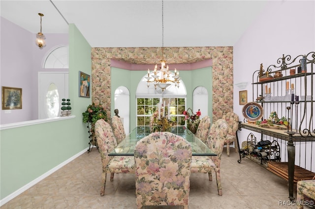 dining room featuring a notable chandelier