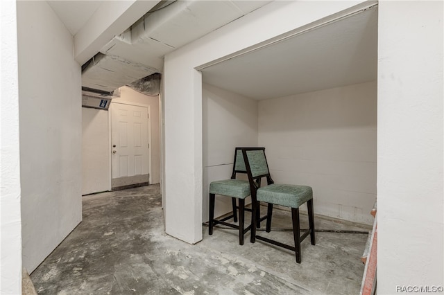 interior space featuring concrete flooring