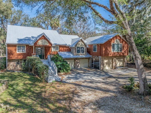 view of front of property with a garage