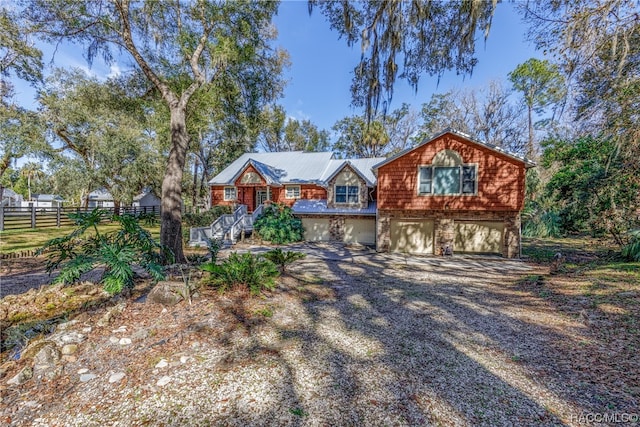 view of front of property with a garage