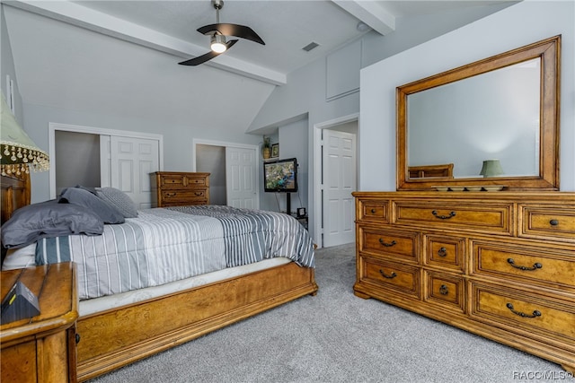 bedroom featuring ceiling fan, carpet, and lofted ceiling with beams