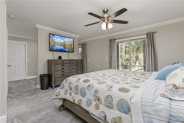 bedroom with light carpet, a textured ceiling, ceiling fan, and crown molding