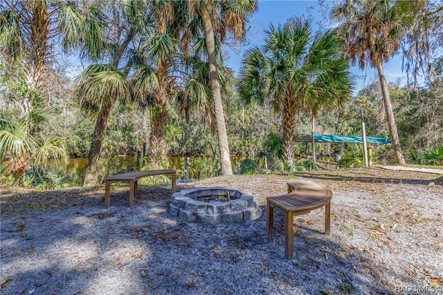 view of patio / terrace featuring a fire pit