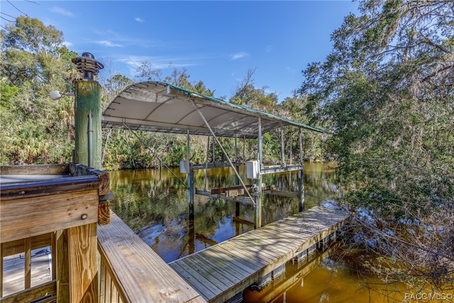 dock area featuring a water view