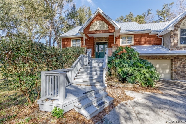 view of front of property with a garage