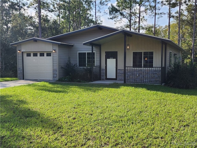 single story home with a front yard and a garage