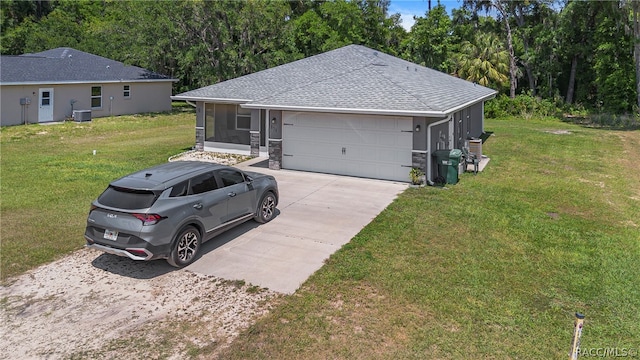 garage with a lawn