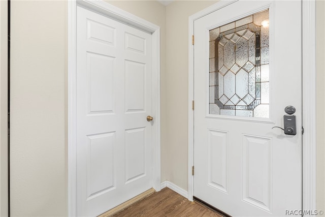 entrance foyer featuring dark hardwood / wood-style flooring