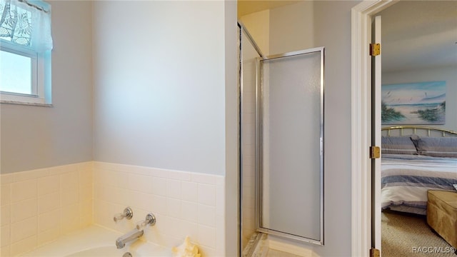 bathroom with a shower with shower door