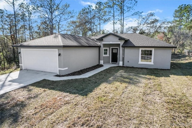 single story home featuring a front yard and a garage