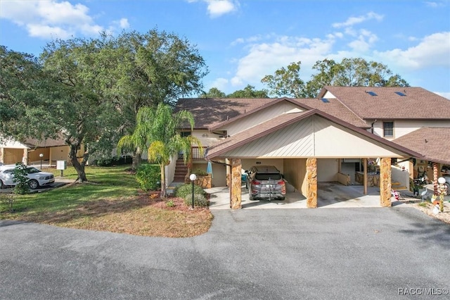 view of front of house with a carport