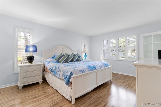 bedroom featuring light hardwood / wood-style flooring