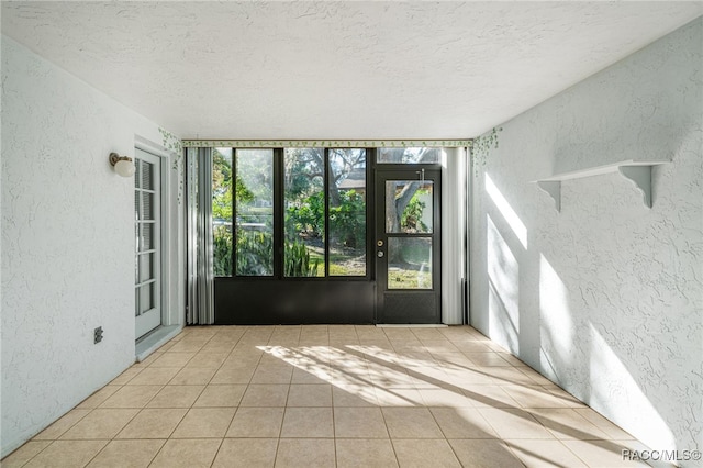 view of tiled spare room