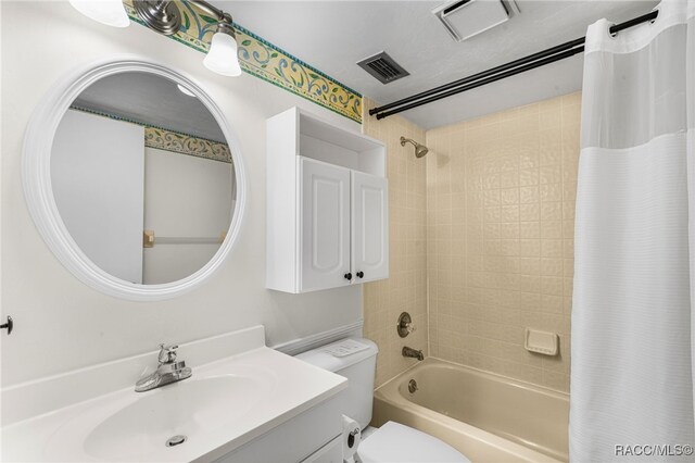 tiled spare room featuring a chandelier, french doors, and a textured ceiling