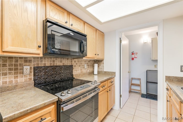 kitchen featuring backsplash, light brown cabinetry, stainless steel range with electric cooktop, and light tile patterned flooring