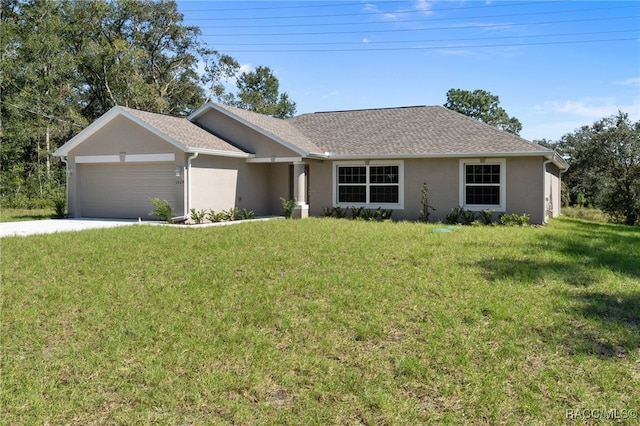 ranch-style home featuring a front lawn and a garage