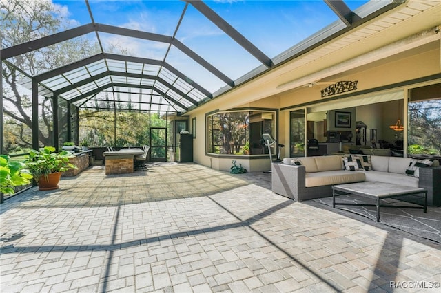 view of patio featuring a lanai and outdoor lounge area