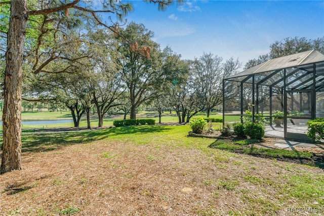 view of yard featuring a lanai