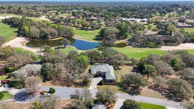 bird's eye view featuring a water view and golf course view