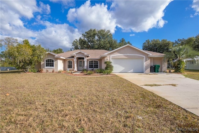 ranch-style home featuring a front lawn and a garage