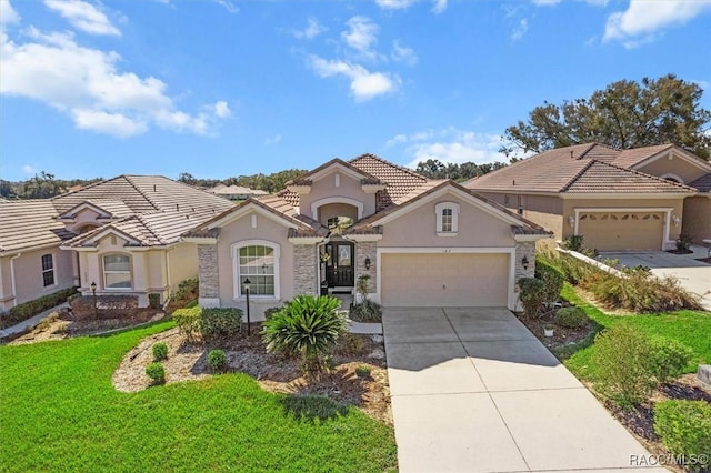 mediterranean / spanish-style house featuring driveway, a tile roof, an attached garage, a front lawn, and stucco siding