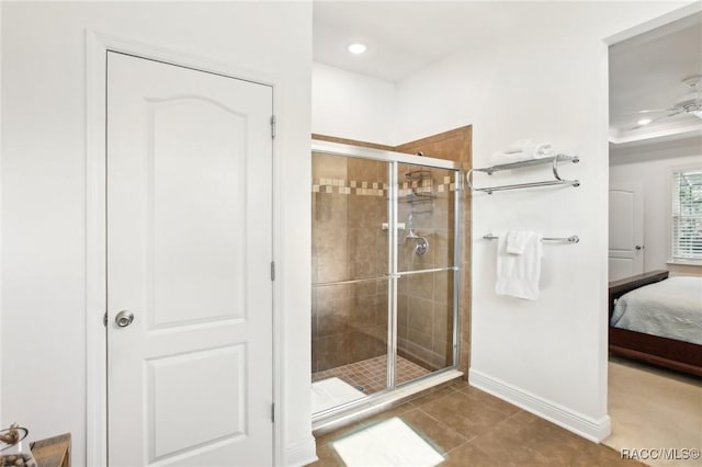 bathroom with tile patterned floors and walk in shower