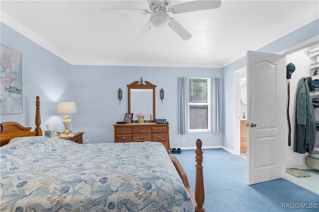 bedroom with connected bathroom, ceiling fan, carpet floors, and ornamental molding