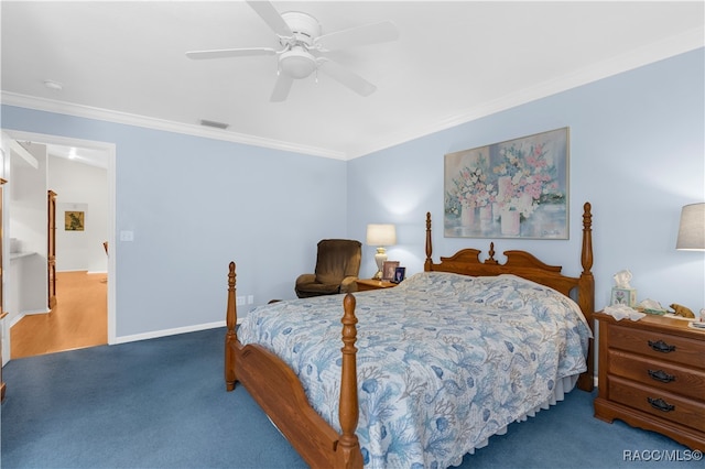 carpeted bedroom featuring ceiling fan and crown molding