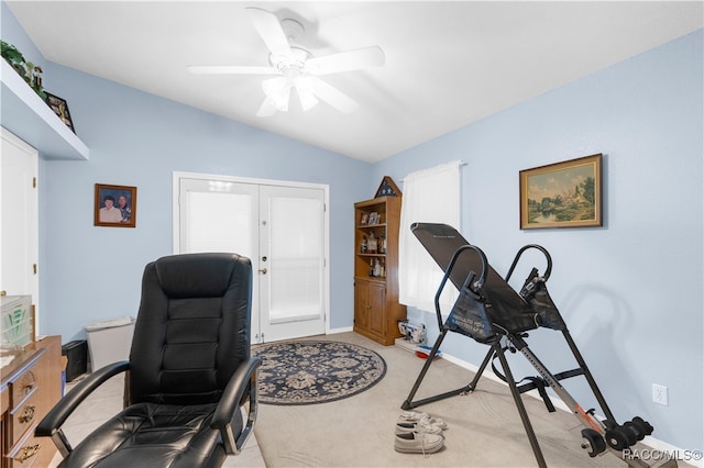 carpeted office with ceiling fan, lofted ceiling, and french doors