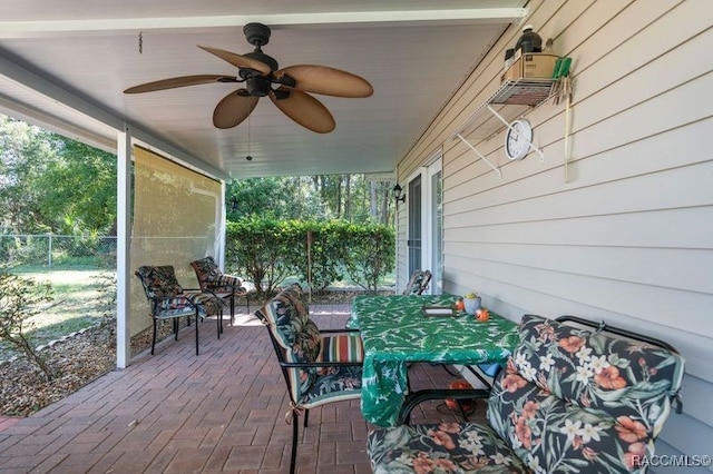 view of patio featuring ceiling fan