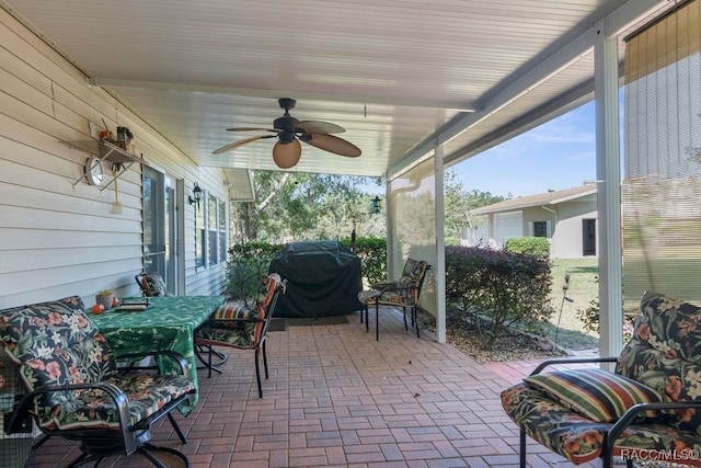 view of patio featuring ceiling fan and grilling area