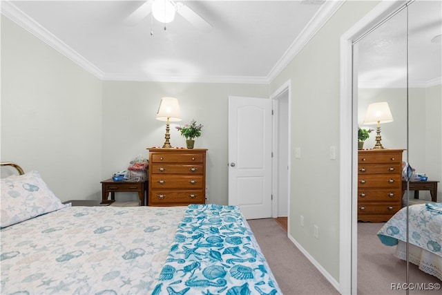 carpeted bedroom with ceiling fan and crown molding