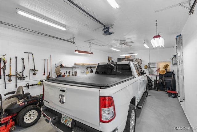 garage featuring a garage door opener and ceiling fan