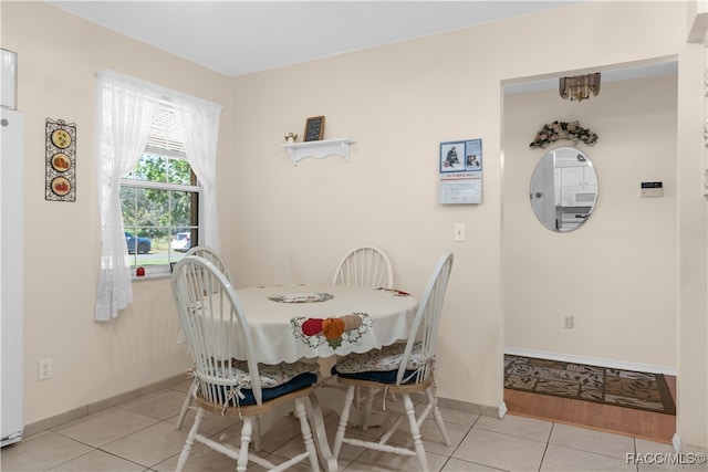 dining area featuring light hardwood / wood-style flooring