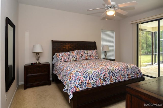 bedroom with ceiling fan, access to exterior, and light colored carpet