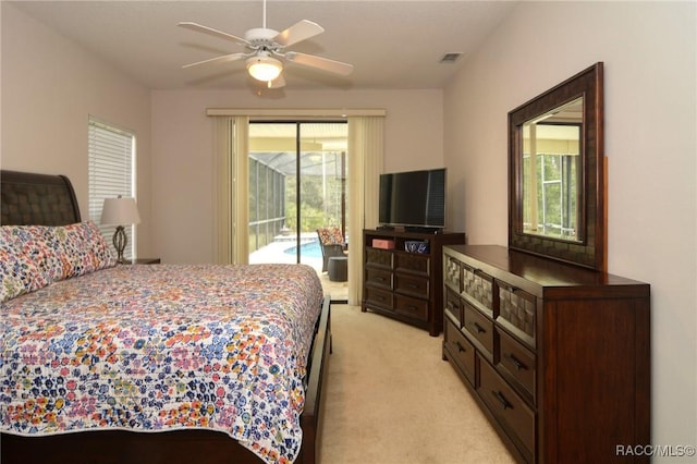 carpeted bedroom with access to exterior and ceiling fan