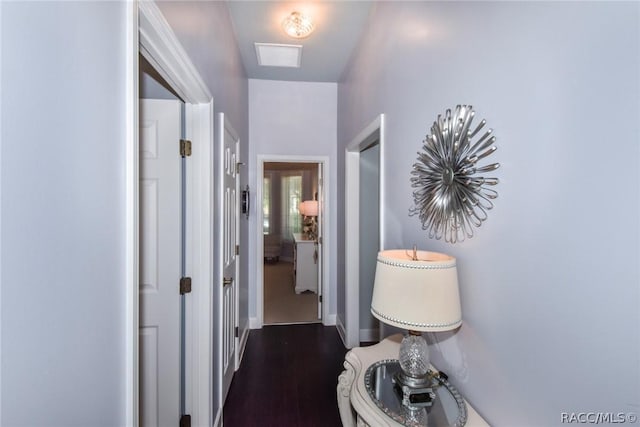 corridor with dark wood-type flooring