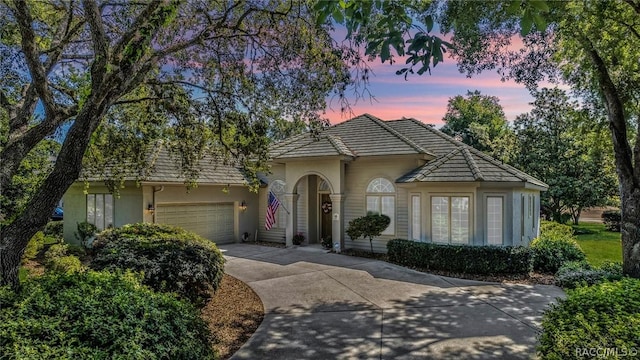 view of front of home with a garage