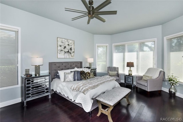 bedroom with wood-type flooring and ceiling fan