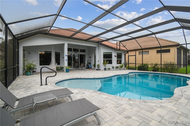 1049 W Lake Valley Ct, Hernando, FL 34442 - outdoor pool with a patio, ceiling fan, and a lanai