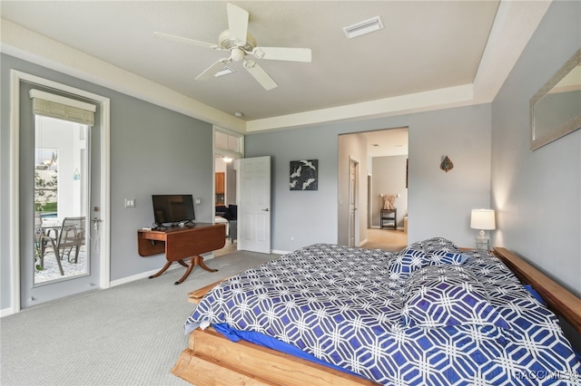 carpeted bedroom featuring access to exterior and ceiling fan