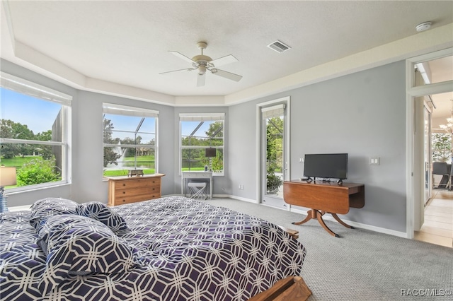 carpeted bedroom with ceiling fan