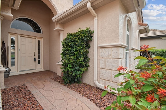 1049 W Lake Valley Ct, Hernando, FL 34442 - property entrance featuring stucco siding