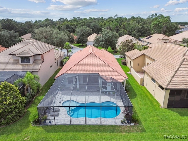 1049 W Lake Valley Ct, Hernando, FL 34442 - view of swimming pool featuring a patio area, a yard, a lanai, and a residential view