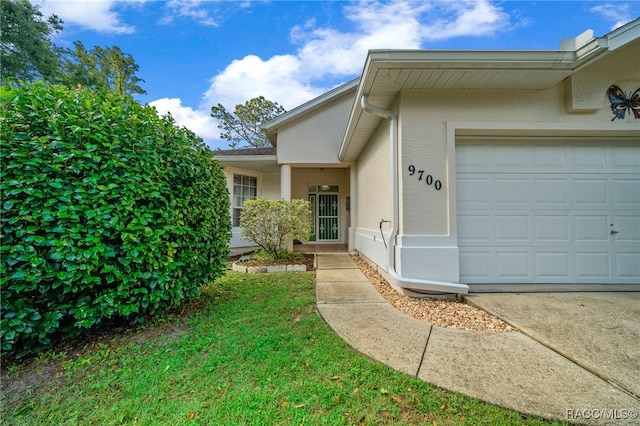 entrance to property with a garage